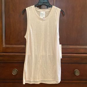 ⭐️ NEW • NWT ⭐️ Lululemon soft pink Uncovered Tall Tank size 2